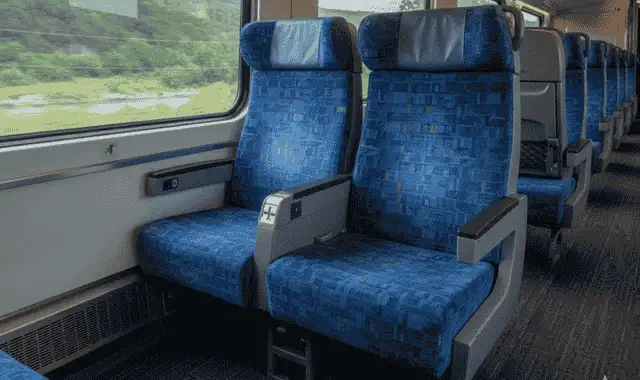 Spacious Amtrak Coach Class Seats with legrests and trays